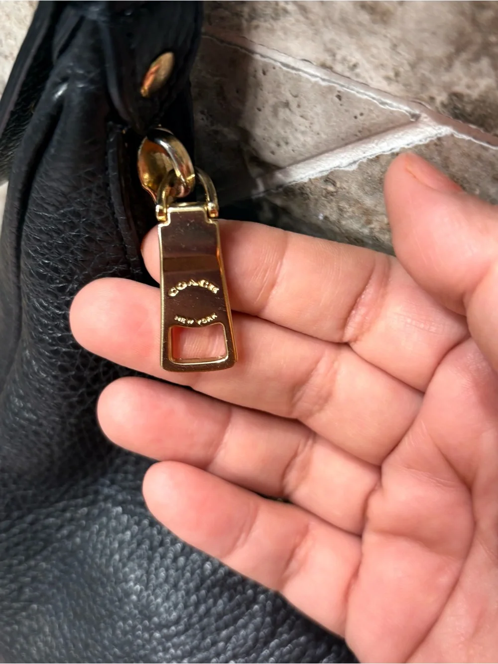 Coach Black Pebbled Leather Shoulder Bag with Red Flower Charm